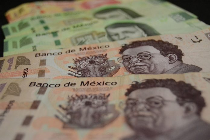 Peso se fortalece tras Fed y firma del T-MEC